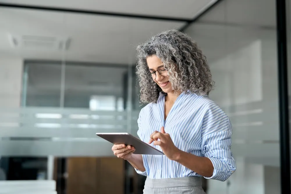 Woman using a tablet in an office